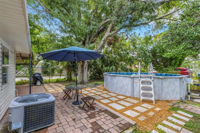 view of patio featuring central air condition unit