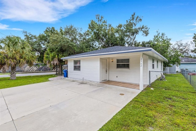 garage with a lawn