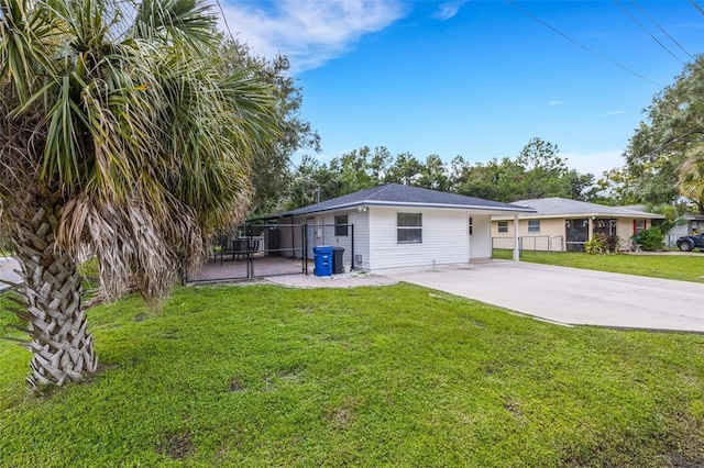 ranch-style house with a front lawn