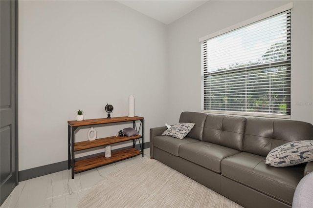 living room featuring plenty of natural light