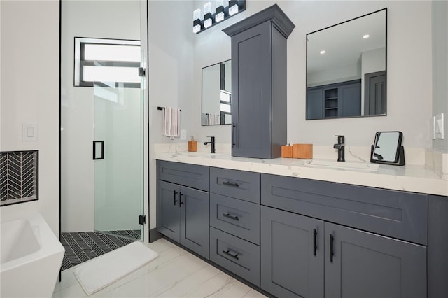 bathroom with vanity and separate shower and tub