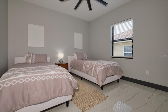 bedroom featuring ceiling fan