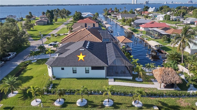 drone / aerial view featuring a water view