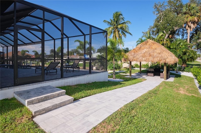 view of community with a lawn and a gazebo