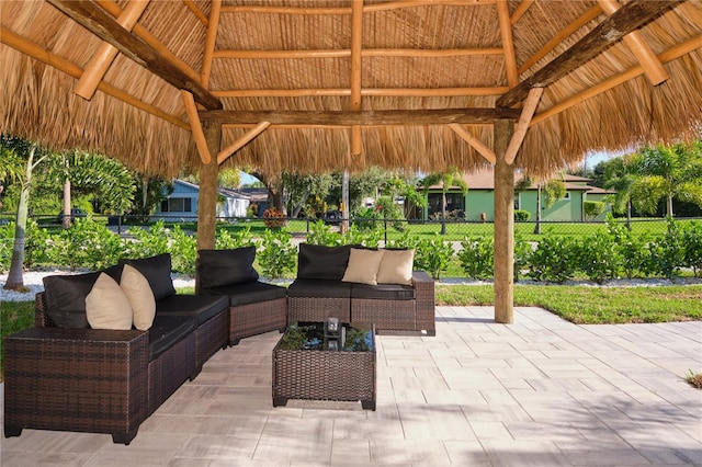 view of patio featuring an outdoor hangout area and a gazebo