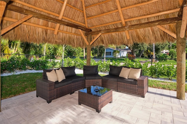 view of patio / terrace with outdoor lounge area and a gazebo