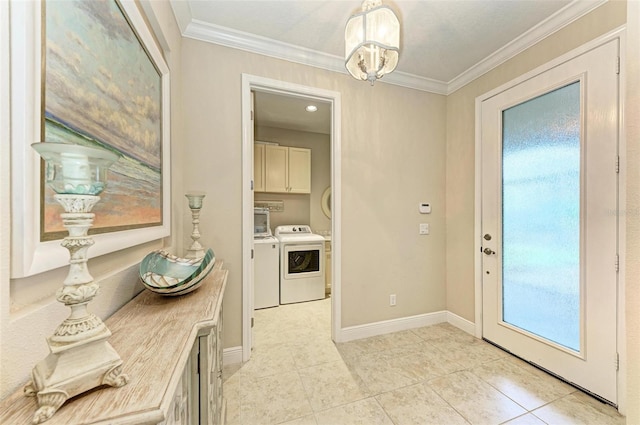 doorway with baseboards, ornamental molding, light tile patterned floors, and washer and dryer