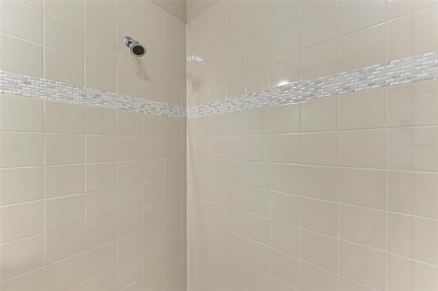 room details with a tile shower