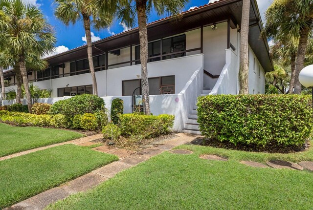 3500 El Conquistador Pkwy Unit 238, Bradenton, FL 34210 - view of property featuring stairway