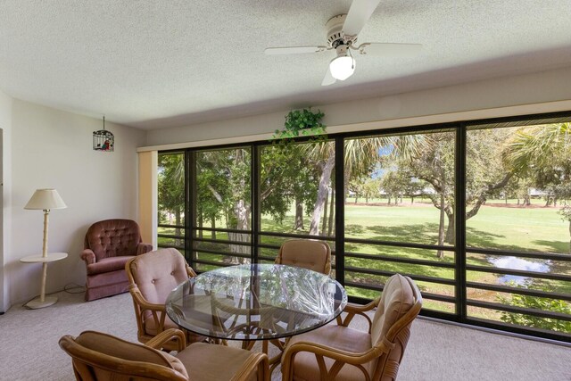 3500 El Conquistador Pkwy Unit 238, Bradenton, FL 34210 - sunroom / solarium with a ceiling fan and outdoor dining space