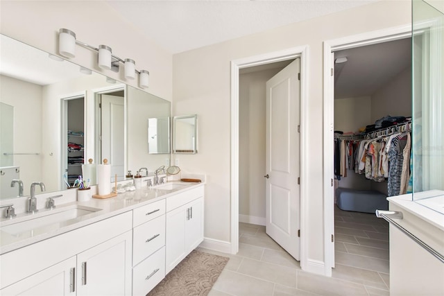 bathroom with vanity and tile patterned floors