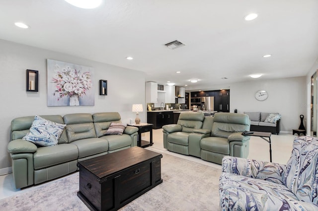 living room featuring sink