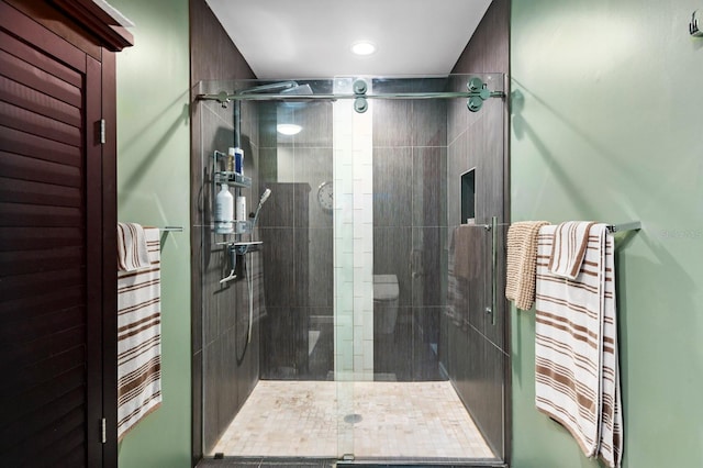 bathroom featuring an enclosed shower