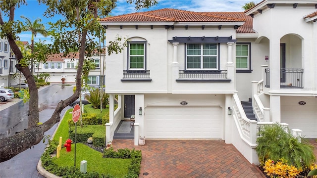 mediterranean / spanish-style house featuring a garage