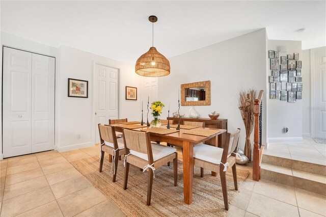 dining area with light tile patterned floors