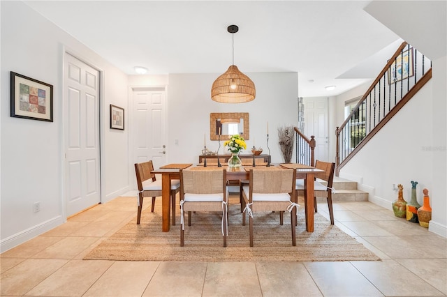 dining room featuring light tile patterned flooring