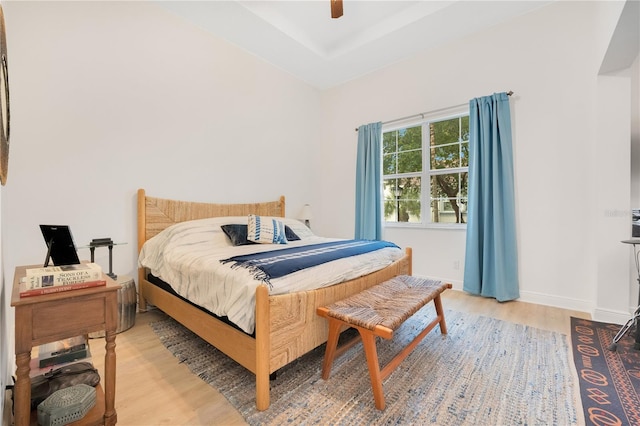 bedroom featuring ceiling fan and hardwood / wood-style flooring