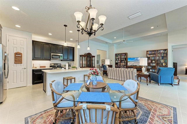 dining room featuring light tile patterned floors, recessed lighting, a raised ceiling, and visible vents