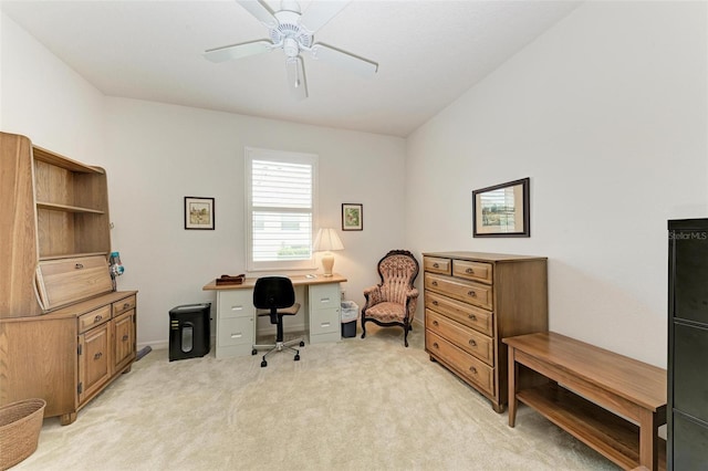 carpeted home office with ceiling fan