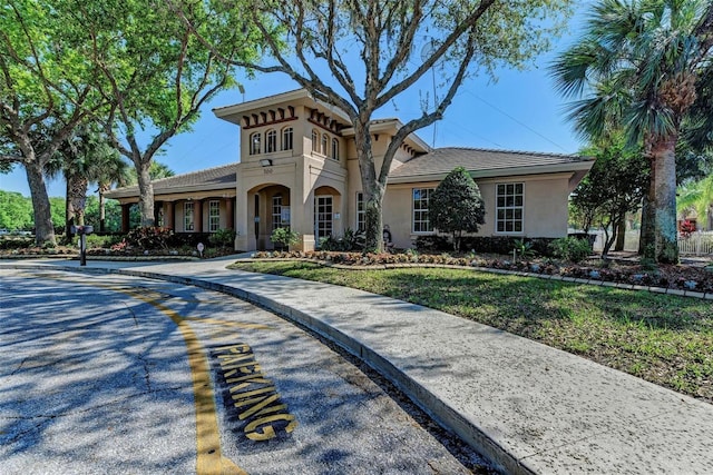 view of front of property featuring stucco siding