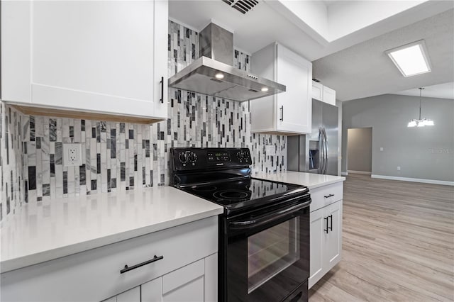 3240 Flamingo Ln, Mulberry, FL 33860 - kitchen with wall chimney range hood, black electric range oven, stainless steel fridge with ice dispenser, tasteful backsplash, and light countertops