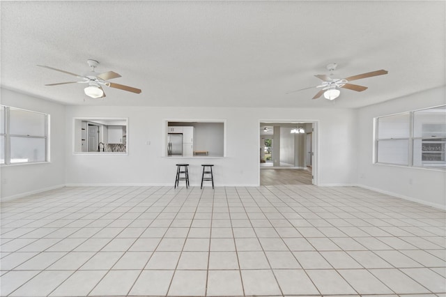 3240 Flamingo Ln, Mulberry, FL 33860 - spare room with a ceiling fan and a textured ceiling