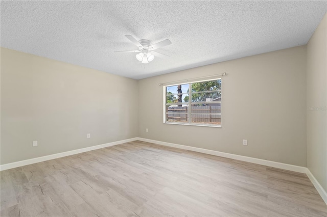 3240 Flamingo Ln, Mulberry, FL 33860 - spare room with ceiling fan, light wood-type flooring, and a textured ceiling