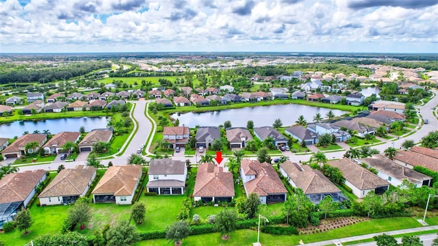 drone / aerial view featuring a water view