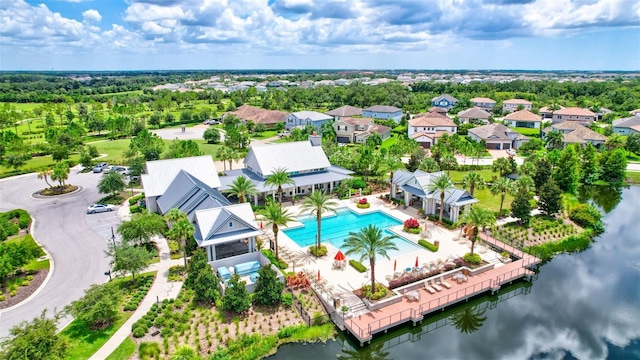 birds eye view of property featuring a water view