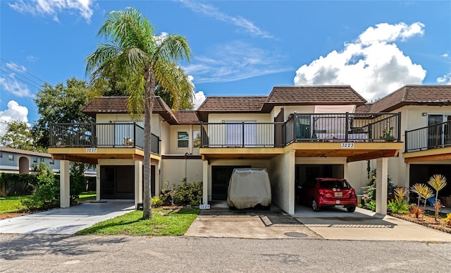 view of front of property with a balcony