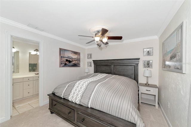 bedroom featuring crown molding, light colored carpet, ceiling fan, and ensuite bathroom