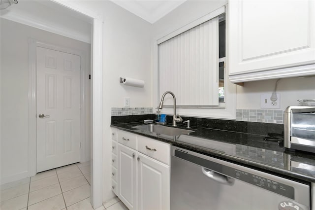 kitchen featuring white cabinets, ornamental molding, sink, and stainless steel dishwasher