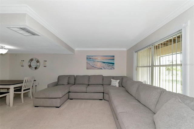 carpeted living room with crown molding