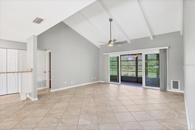 unfurnished living room with beam ceiling, ceiling fan, light tile patterned floors, and high vaulted ceiling