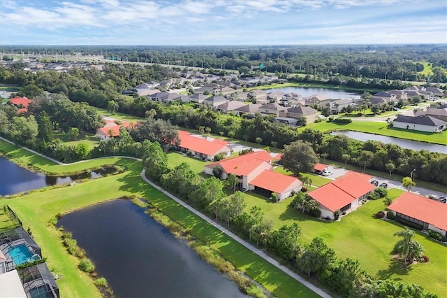 drone / aerial view with a water view