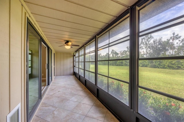 6384 Draw Ln Unit 38, Sarasota, FL 34238 - unfurnished sunroom with plenty of natural light and ceiling fan
