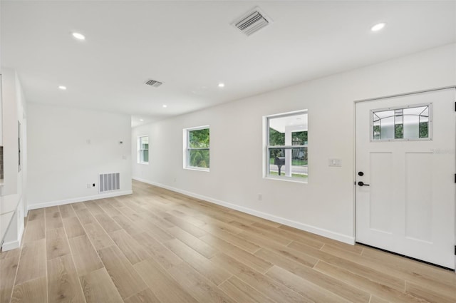 foyer entrance featuring light hardwood / wood-style floors