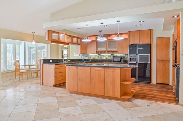 kitchen featuring open shelves, decorative backsplash, a sink, a peninsula, and black appliances