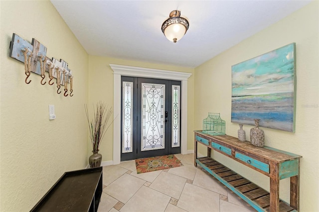 entrance foyer with light tile patterned flooring