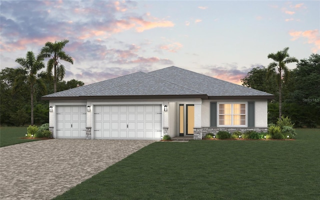 view of front of house with stone siding, an attached garage, decorative driveway, a front lawn, and stucco siding