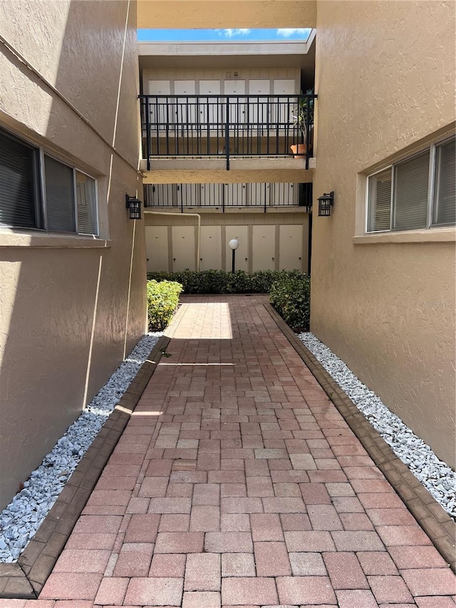 view of patio with a balcony