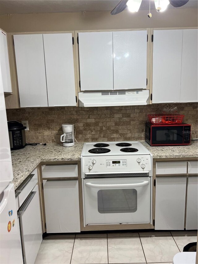 kitchen featuring white range with electric cooktop, decorative backsplash, and white cabinetry