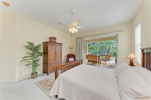 bedroom with carpet flooring, access to exterior, and ceiling fan