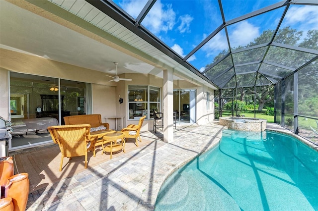 view of pool featuring a patio area, ceiling fan, and glass enclosure