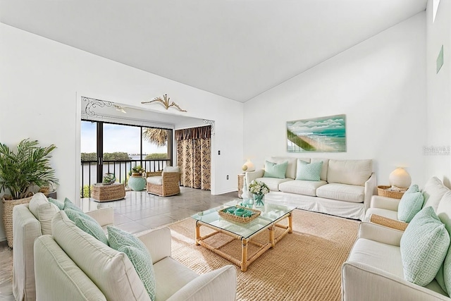 living room featuring lofted ceiling