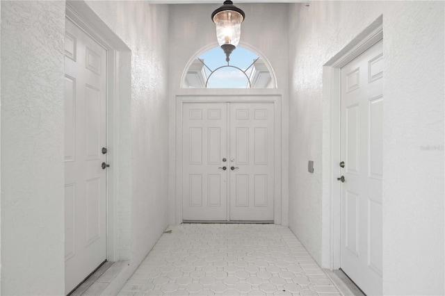 view of tiled foyer entrance