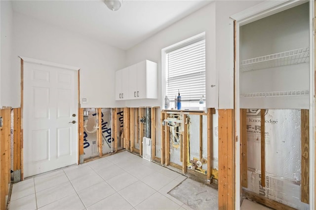 interior space with light tile patterned floors