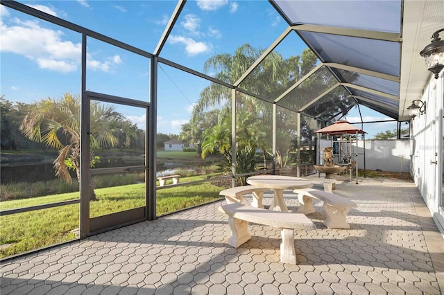 sunroom with a water view