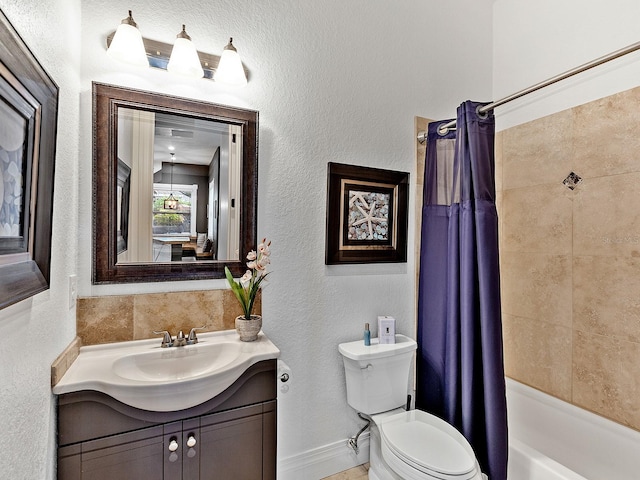 full bathroom featuring toilet, shower / tub combo, and vanity