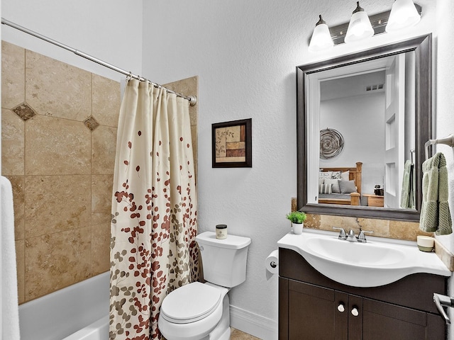 full bathroom featuring vanity, toilet, and shower / bath combo with shower curtain